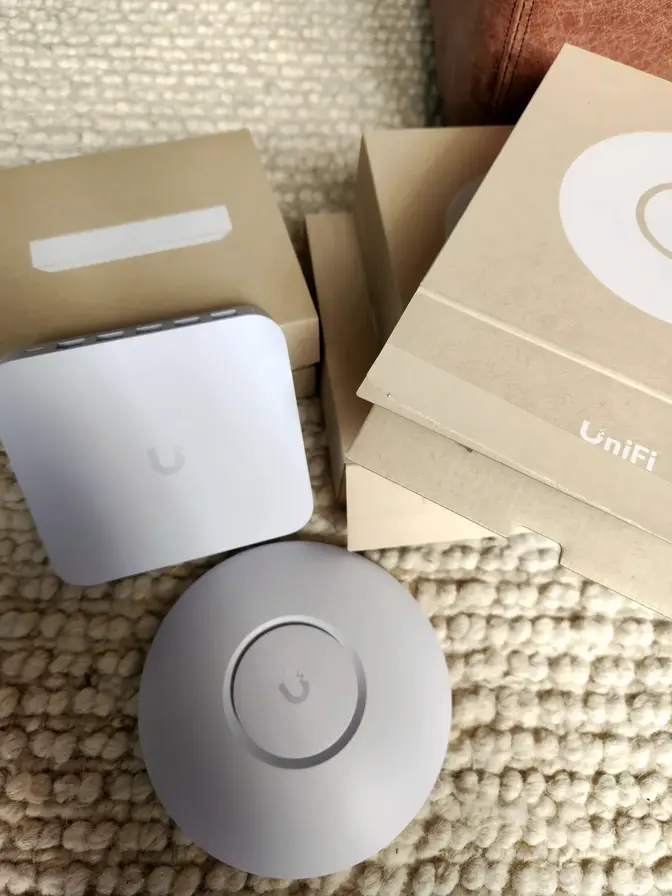 Ubiquiti UniFi wireless access points and security gateway hardware used by The Real Smart Home for high-performance enterprise-grade home networking.