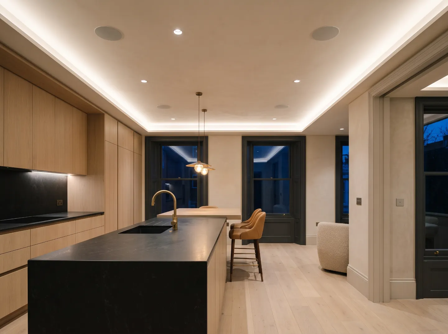 Kitchen with flush ceiling speakers and layered KNX lighting scene